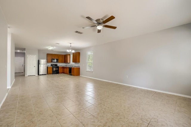 9008 Tall Sky Trce, Austin, TX 78724 - unfurnished living room featuring baseboards, a chandelier, a ceiling fan, and light tile patterned flooring