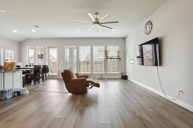 13212 Carol Lawler Ln, Manor, TX 78653 - living room with wood finished floors, a ceiling fan, and recessed lighting