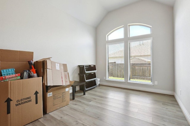 13212 Carol Lawler Ln, Manor, TX 78653 - sitting room with light wood-style flooring, lofted ceiling, and heating unit