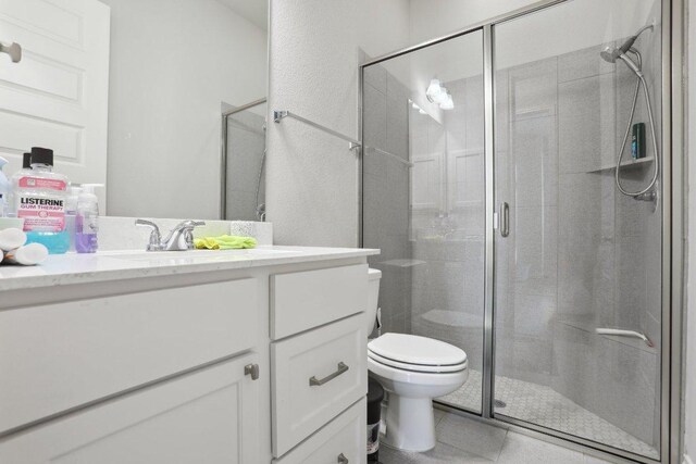 13212 Carol Lawler Ln, Manor, TX 78653 - full bath featuring vanity, a stall shower, and tile patterned floors
