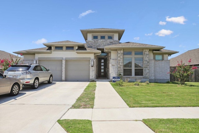 13212 Carol Lawler Ln, Manor, TX 78653 - prairie-style house with an attached garage, driveway, and stone siding