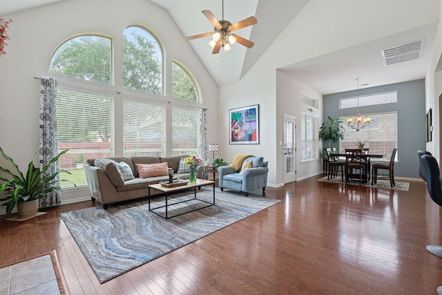 9905 Palmbrook Dr, Austin, TX 78717 - living area featuring high vaulted ceiling, wood-type flooring, a chandelier, and a ceiling fan