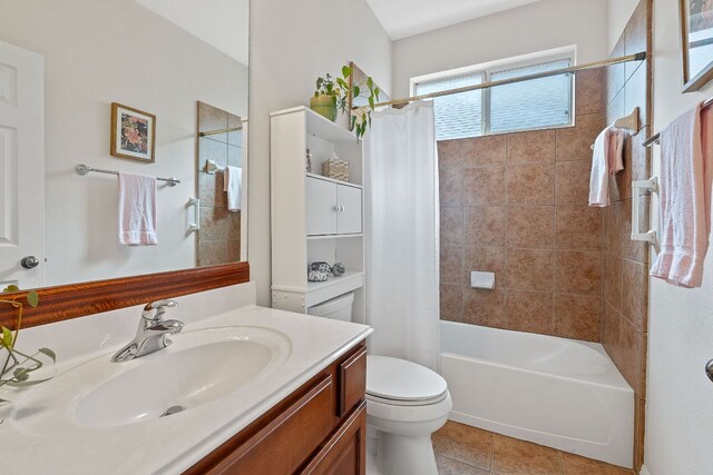 9905 Palmbrook Dr, Austin, TX 78717 - full bath featuring vanity, toilet, tile patterned floors, and shower / bath combination with curtain