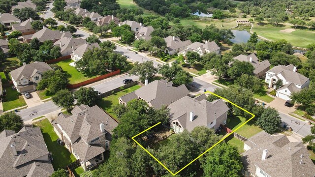 9905 Palmbrook Dr, Austin, TX 78717 - aerial perspective of suburban area with a nearby body of water and property boundaries highlighted
