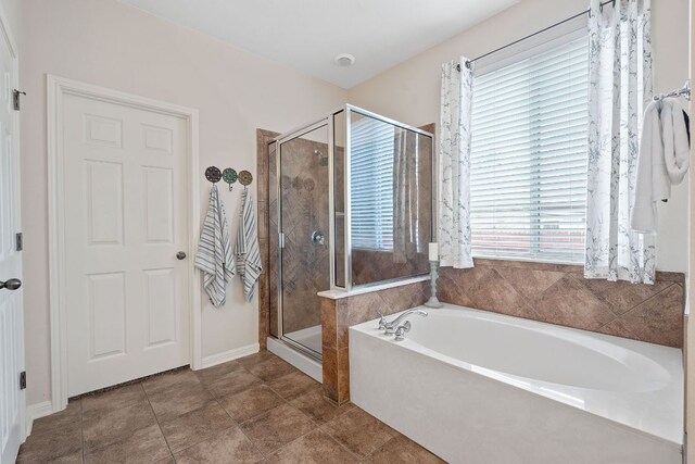 9905 Palmbrook Dr, Austin, TX 78717 - bathroom with a bath and a shower stall