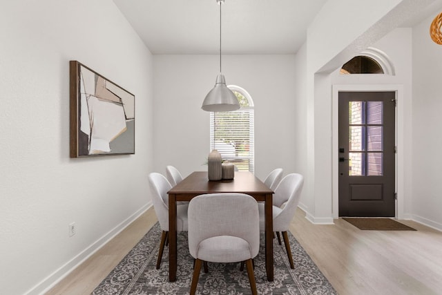 8005 Willet Trl, Austin, TX 78745 - dining area with light wood-style floors and plenty of natural light