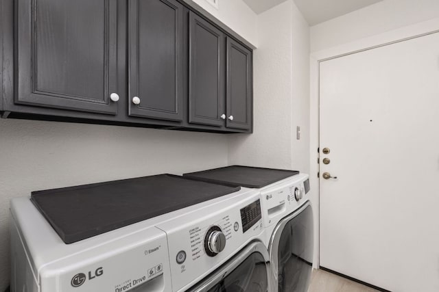 8005 Willet Trl, Austin, TX 78745 - washroom featuring separate washer and dryer and cabinet space