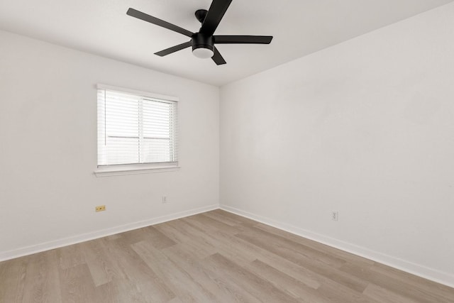 8005 Willet Trl, Austin, TX 78745 - unfurnished room featuring light wood-style flooring, a ceiling fan, and baseboards