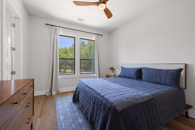 2908 Vista Heights Dr, Leander, TX 78641 - bedroom featuring wood finished floors, baseboards, and ceiling fan