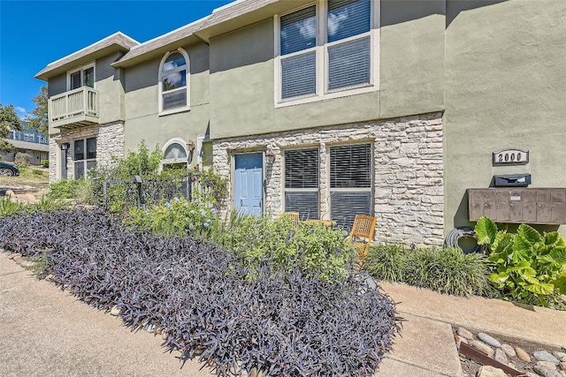 2000 Lightsey Rd Unit 3, Austin, TX 78704 - view of home's exterior featuring stone siding and stucco siding