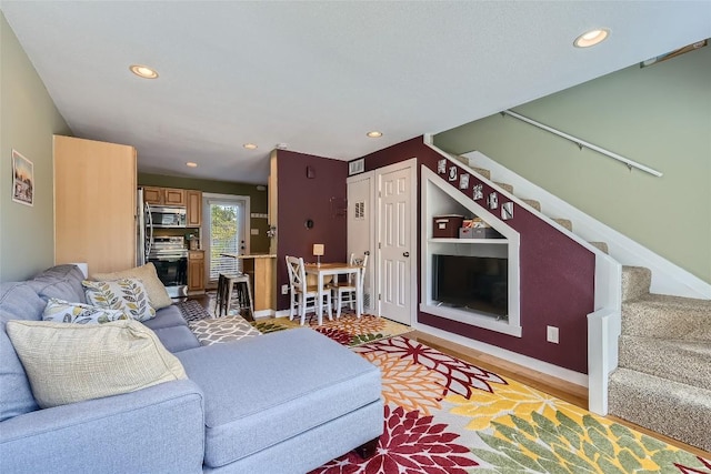2000 Lightsey Rd Unit 3, Austin, TX 78704 - living area with stairway, recessed lighting, baseboards, and light wood finished floors