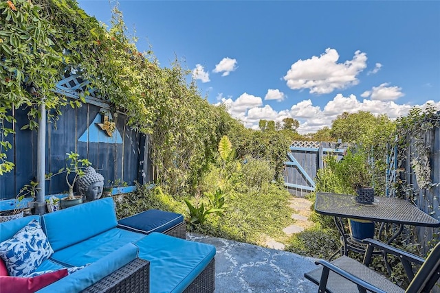 2000 Lightsey Rd Unit 3, Austin, TX 78704 - fenced backyard with outdoor lounge area and a patio