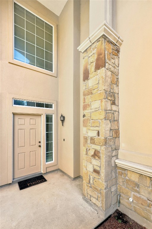 1101 E Parmer Ln Unit 305, Austin, TX 78753 - entrance to property with stone siding and stucco siding
