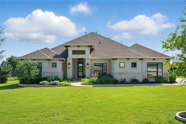 941 Linden Loop, Driftwood, TX 78619 - view of front of property featuring stone siding, stucco siding, a front lawn, and roof with shingles
