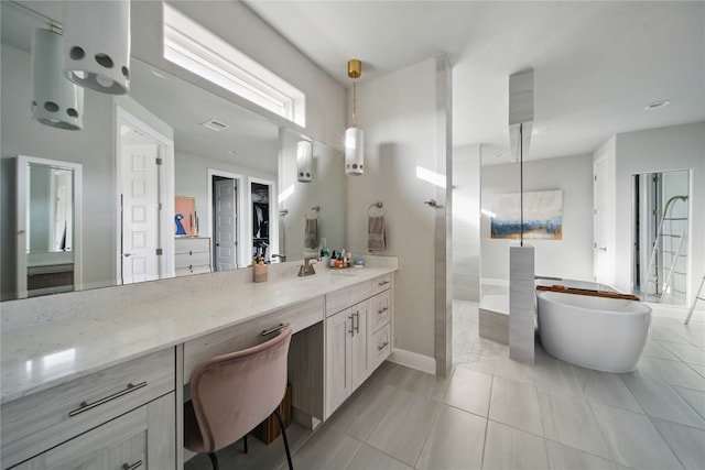 941 Linden Loop, Driftwood, TX 78619 - bathroom featuring a freestanding tub, vanity, and walk in shower