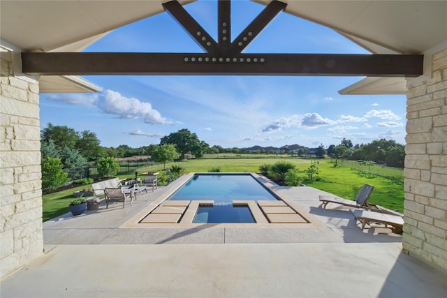 941 Linden Loop, Driftwood, TX 78619 - outdoor pool featuring a patio area, a yard, and a mountain view