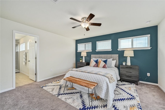10612 Harwood Overlook Cv, Austin, TX 78747 - bedroom featuring carpet, ceiling fan, and ensuite bathroom