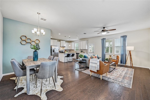 10612 Harwood Overlook Cv, Austin, TX 78747 - dining area featuring a chandelier, a ceiling fan, recessed lighting, and dark wood-type flooring