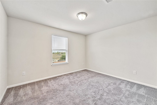 10612 Harwood Overlook Cv, Austin, TX 78747 - carpeted empty room with baseboards