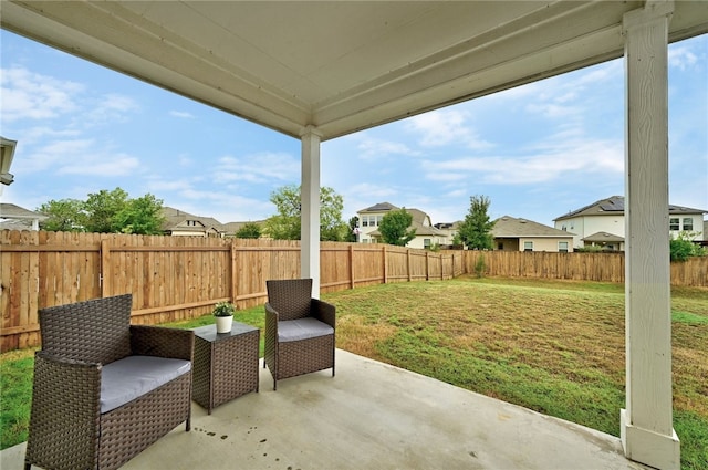 10612 Harwood Overlook Cv, Austin, TX 78747 - fenced backyard with a patio and a residential view