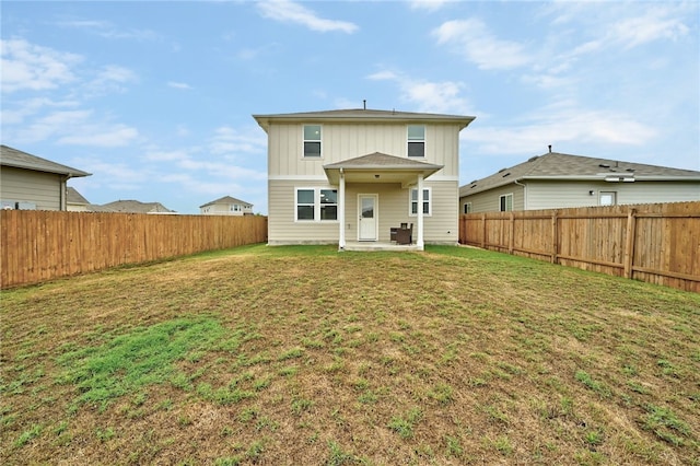 10612 Harwood Overlook Cv, Austin, TX 78747 - back of house with a patio area, a fenced backyard, and board and batten siding