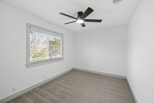 500 Arbor Ln, Austin, TX 78745 - carpeted empty room with ceiling fan and baseboards