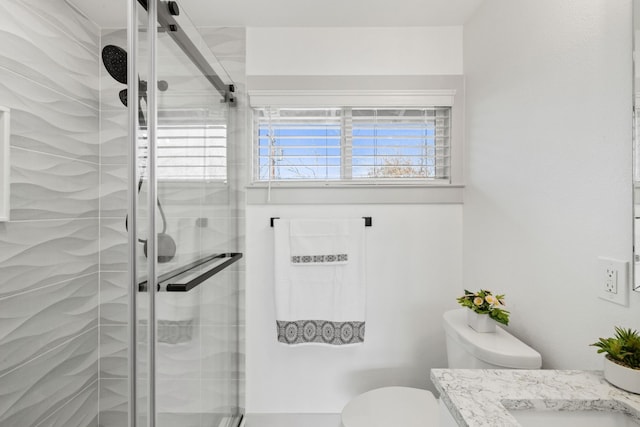 500 Arbor Ln, Austin, TX 78745 - full bathroom featuring vanity, a stall shower, and toilet
