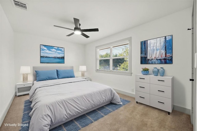 500 Arbor Ln, Austin, TX 78745 - bedroom featuring light colored carpet, baseboards, and ceiling fan