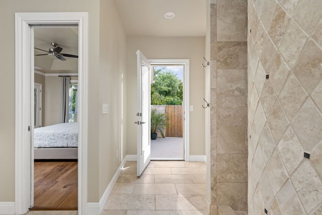 137 Lone Cypress Cv, Driftwood, TX 78619 - foyer entrance with baseboards and a ceiling fan