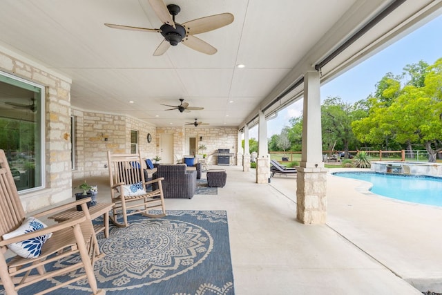 137 Lone Cypress Cv, Driftwood, TX 78619 - view of patio / terrace with a ceiling fan, a pool with connected hot tub, and an outdoor hangout area
