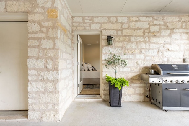 137 Lone Cypress Cv, Driftwood, TX 78619 - doorway to property with stone siding