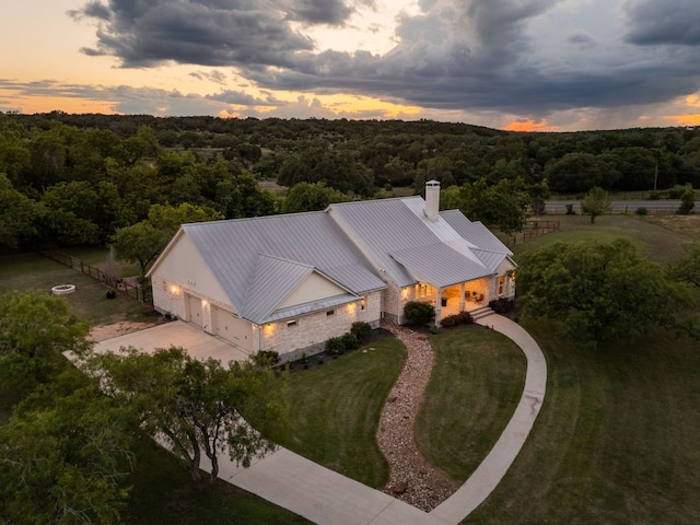 137 Lone Cypress Cv, Driftwood, TX 78619 - aerial view at dusk of a view of trees