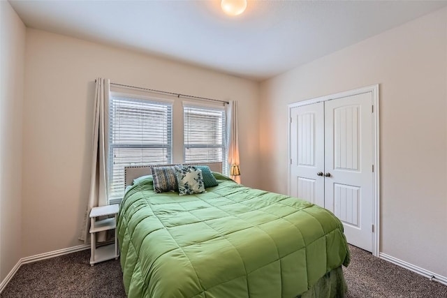 2712 Auburn Chestnut Ln, Pflugerville, TX 78660 - bedroom with dark colored carpet, baseboards, and a closet