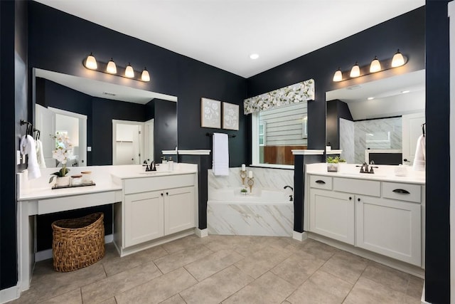 200 Wild Sage Ln, Liberty Hill, TX 78642 - full bath with a bath, two vanities, tile patterned flooring, and a shower