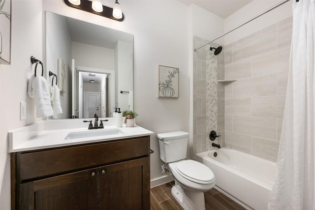 200 Wild Sage Ln, Liberty Hill, TX 78642 - bathroom featuring toilet, vanity, shower / bath combination with curtain, wood finished floors, and baseboards