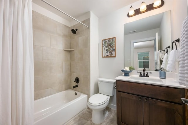 200 Wild Sage Ln, Liberty Hill, TX 78642 - bathroom with toilet, vanity, shower / bath combo with shower curtain, and tile patterned flooring