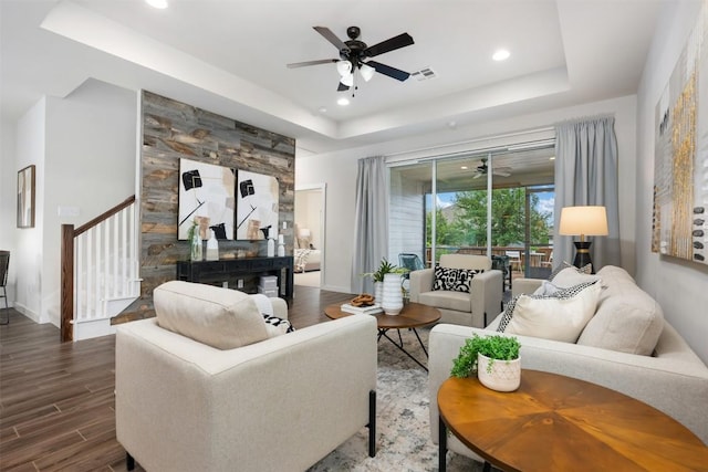 200 Wild Sage Ln, Liberty Hill, TX 78642 - living area featuring a raised ceiling, ceiling fan, stairs, wood finished floors, and recessed lighting