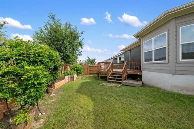 200 Wild Sage Ln, Liberty Hill, TX 78642 - view of yard with a deck and a vegetable garden