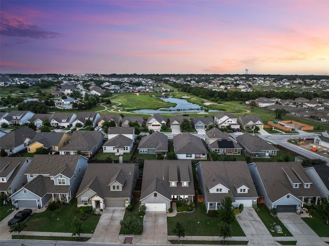 200 Wild Sage Ln, Liberty Hill, TX 78642 - aerial view at dusk of a water view and a residential view