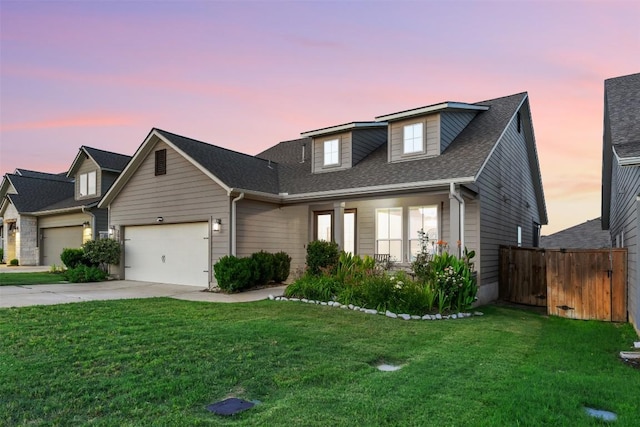 200 Wild Sage Ln, Liberty Hill, TX 78642 - traditional-style house featuring an attached garage, driveway, and a shingled roof