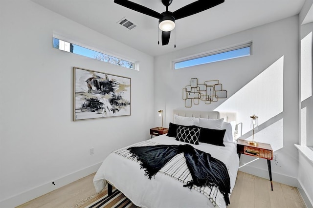 1117 Lawson Ln Unit 2, Austin, TX 78702 - bedroom featuring wood finished floors, baseboards, and a ceiling fan