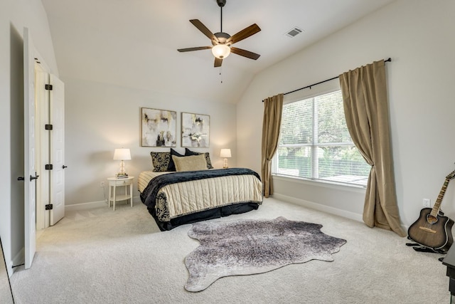 603 Arundel Rd, Austin, TX 78738 - carpeted bedroom with vaulted ceiling, baseboards, and a ceiling fan