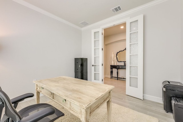 603 Arundel Rd, Austin, TX 78738 - office with crown molding, french doors, light wood finished floors, and baseboards