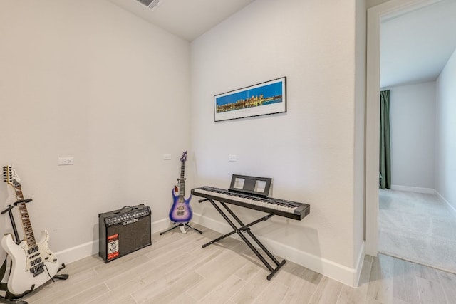 603 Arundel Rd, Austin, TX 78738 - misc room featuring baseboards and light wood finished floors