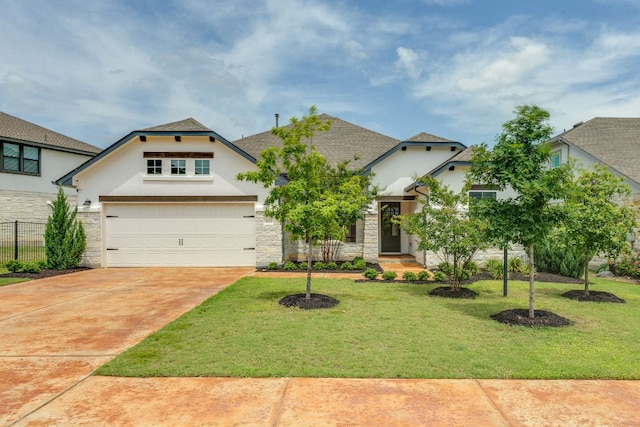 603 Arundel Rd, Austin, TX 78738 - view of front of house featuring stucco siding, stone siding, driveway, a garage, and roof with shingles