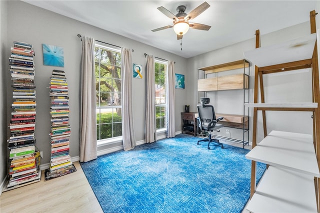 208 Sailors Run, Lakeway, TX 78734 - office area with ceiling fan, baseboards, and wood finished floors