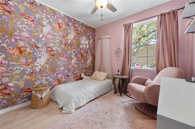 208 Sailors Run, Lakeway, TX 78734 - bedroom with ceiling fan, wood finished floors, and baseboards