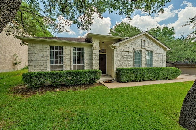 208 Sailors Run, Lakeway, TX 78734 - view of front of property featuring stone siding and a front yard