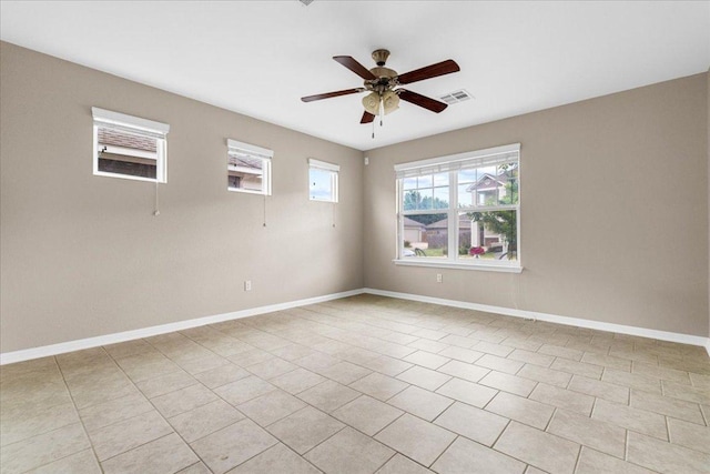 163 Wainscot Oak Way, San Marcos, TX 78666 - unfurnished room with ceiling fan, baseboards, and light tile patterned flooring