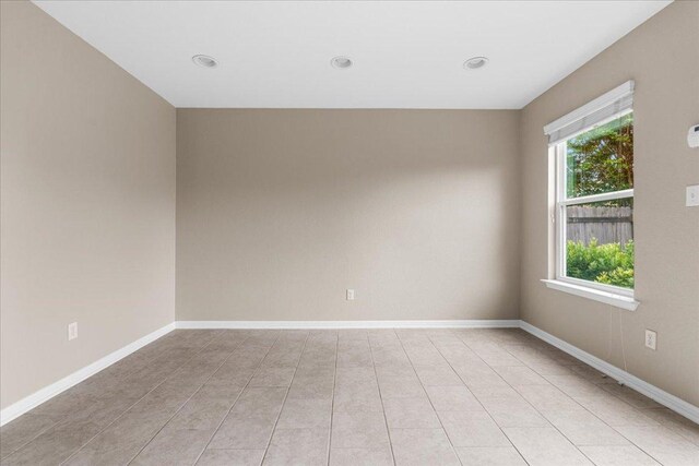 163 Wainscot Oak Way, San Marcos, TX 78666 - unfurnished room featuring baseboards, recessed lighting, and light tile patterned flooring